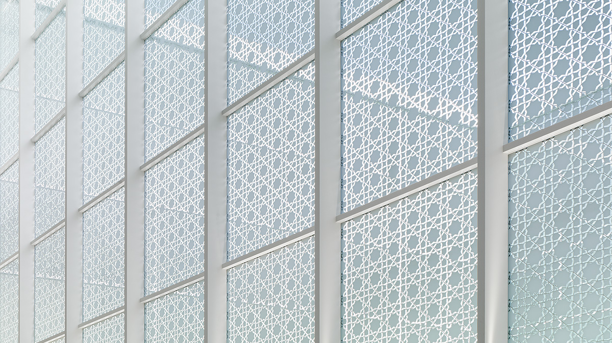 A view of the Aga Khan Museum’s patio window walls and the intricate pattern designs within them